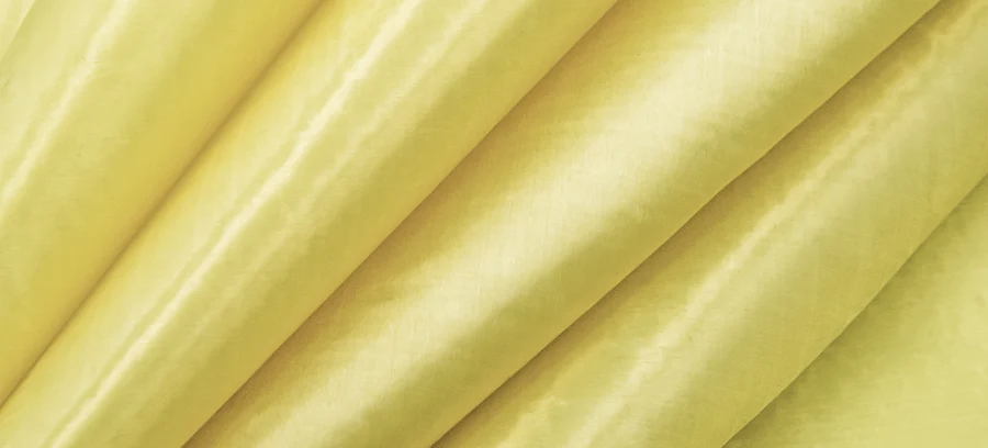 Yellow rolls of ballistic laminate